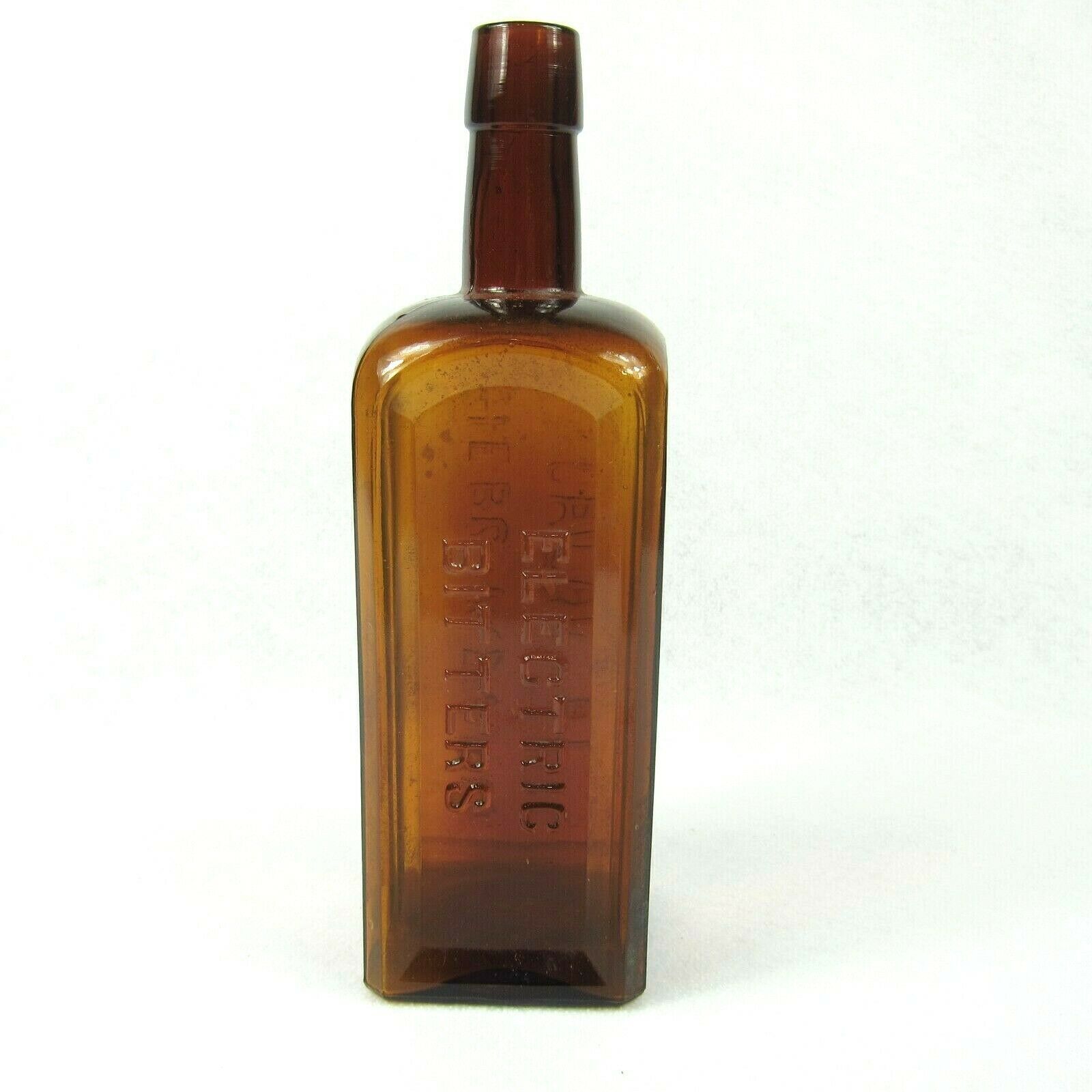 Antique 1800s Electric Bitters Glass Bottle Puce Amber Handtooled
