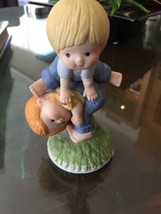 Vintage 1981 Enesco Porcelain Figurine - Boy and Girl Playing Leapfrog - $9.46