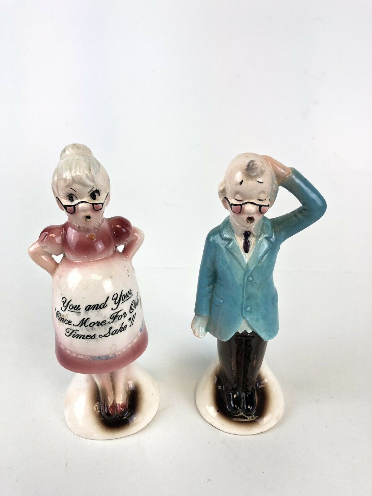 old man and woman ceramic dolls