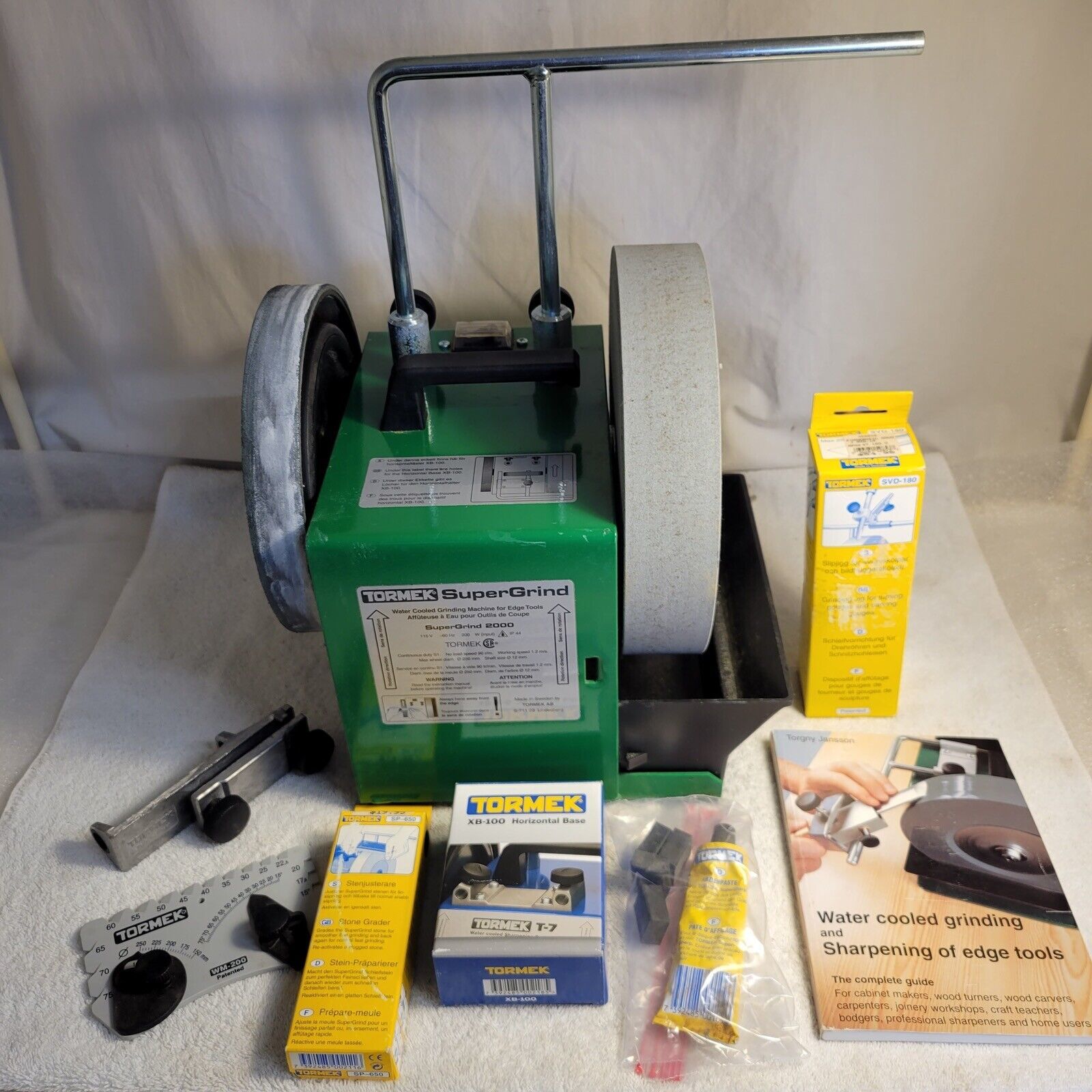Tormek supergrind 2000 water cooled sharpening machine with several