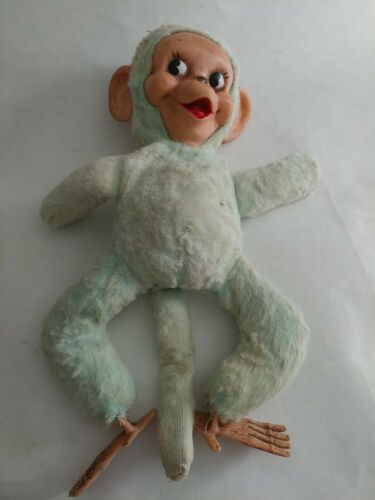 stuffed monkey with plastic face