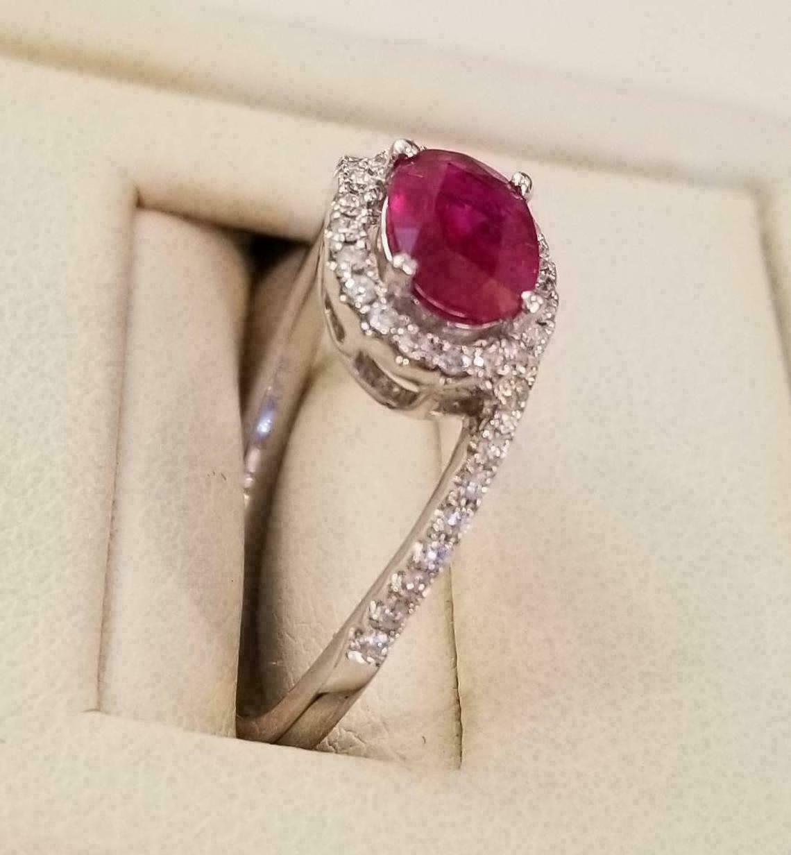 oval ruby halo ring