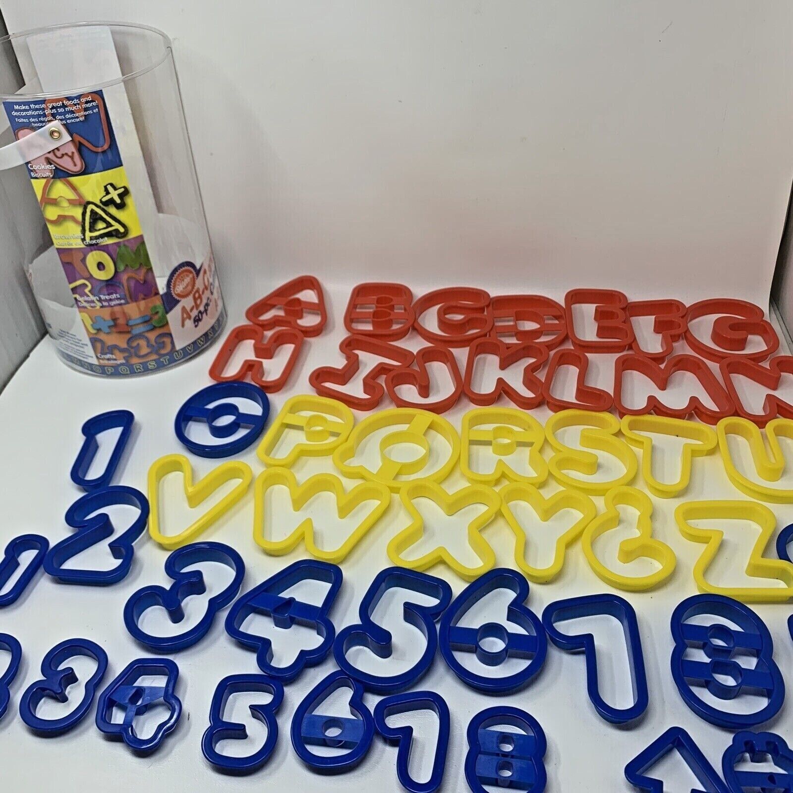 Primary image for Wilton 48 Pcs ABC 123 Alphabet Letters Numbers Math Signs Symbols Cookie Cutters