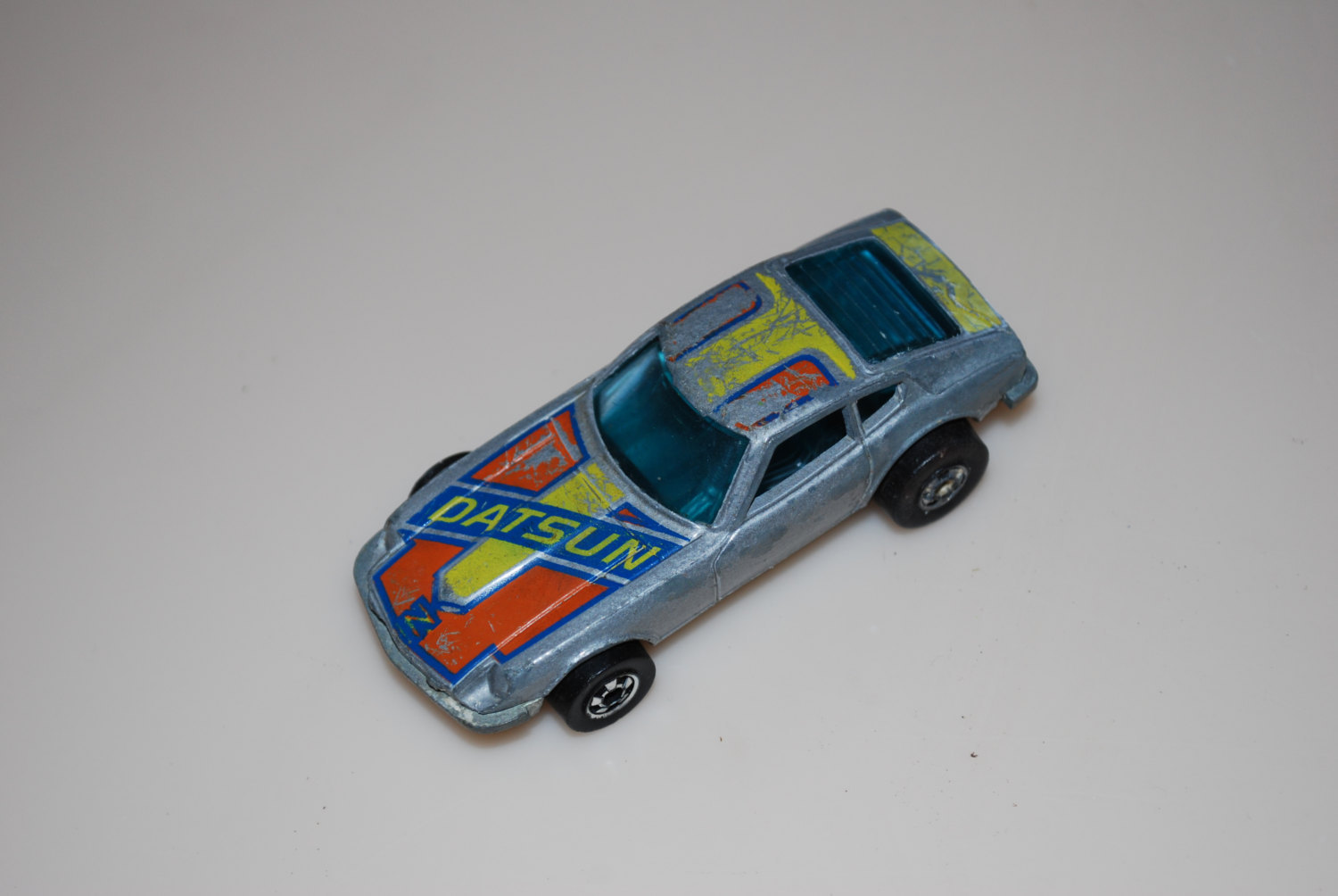 Hot Wheels Mattel 1976 Z Whiz Datsun Gray Silver Blue Yellow Orange