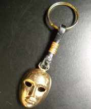 Netura Mask Key Ring Brass Colored Metal Mask and Ring Leather Connector - $7.99
