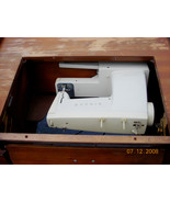 Singer Sewing Machine with Desk and Foot Pedal - $100.00