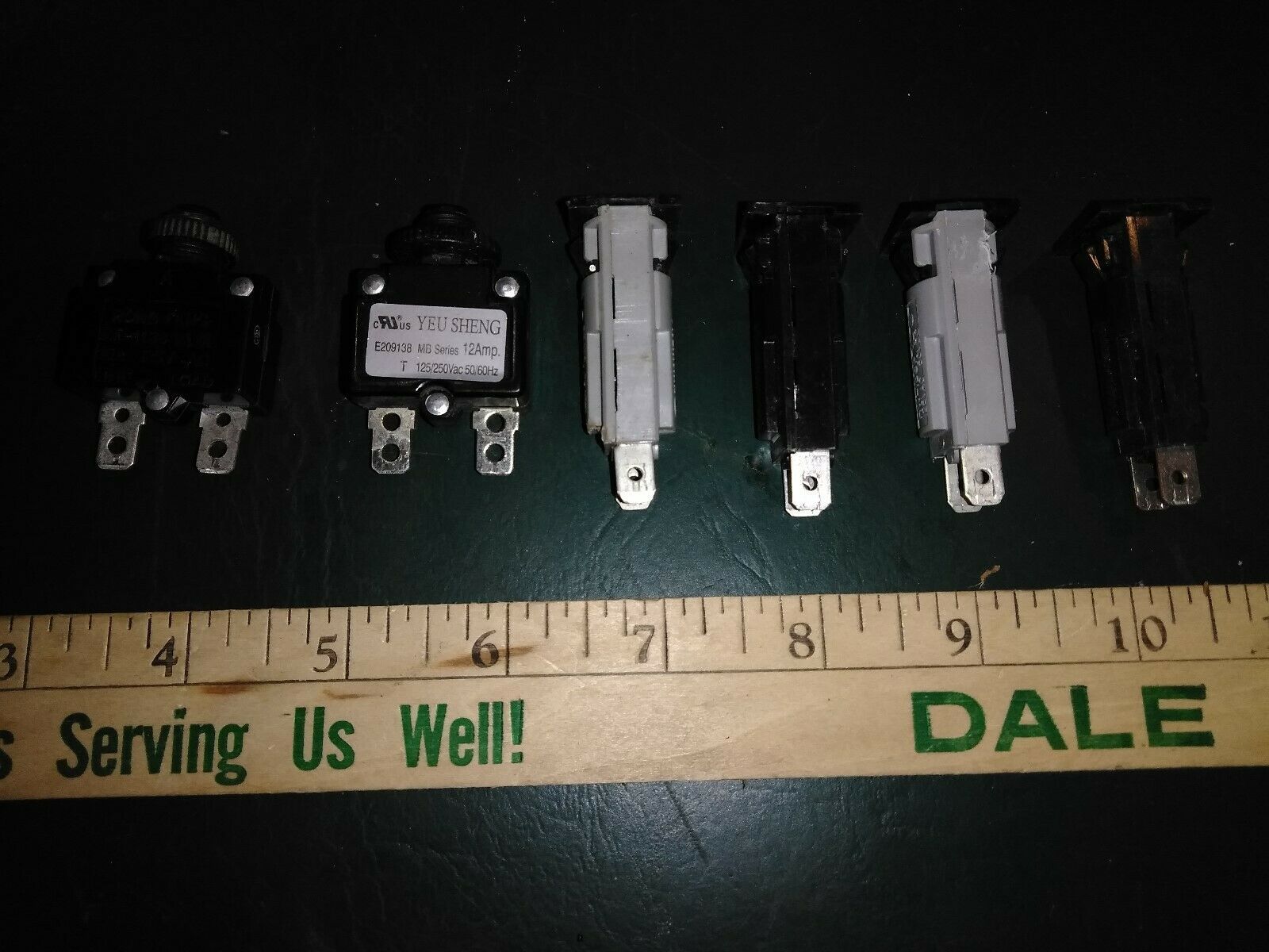 9VV41 ASSORTED CIRCUIT BREAKERS FROM TREADMILLS (1) 10A, (1) 12A, (4