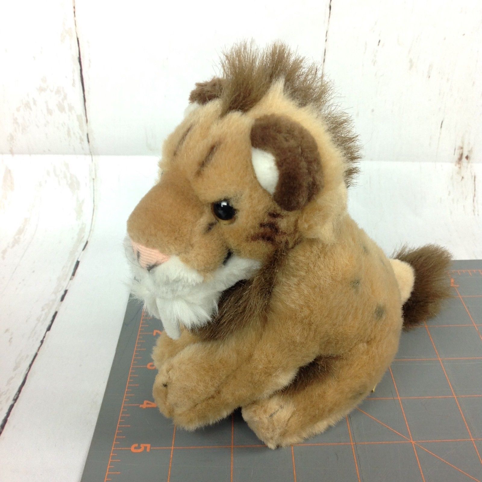 smilodon plush