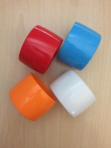 MCM wide bangle acrylic/bakelite bracelets set of 4