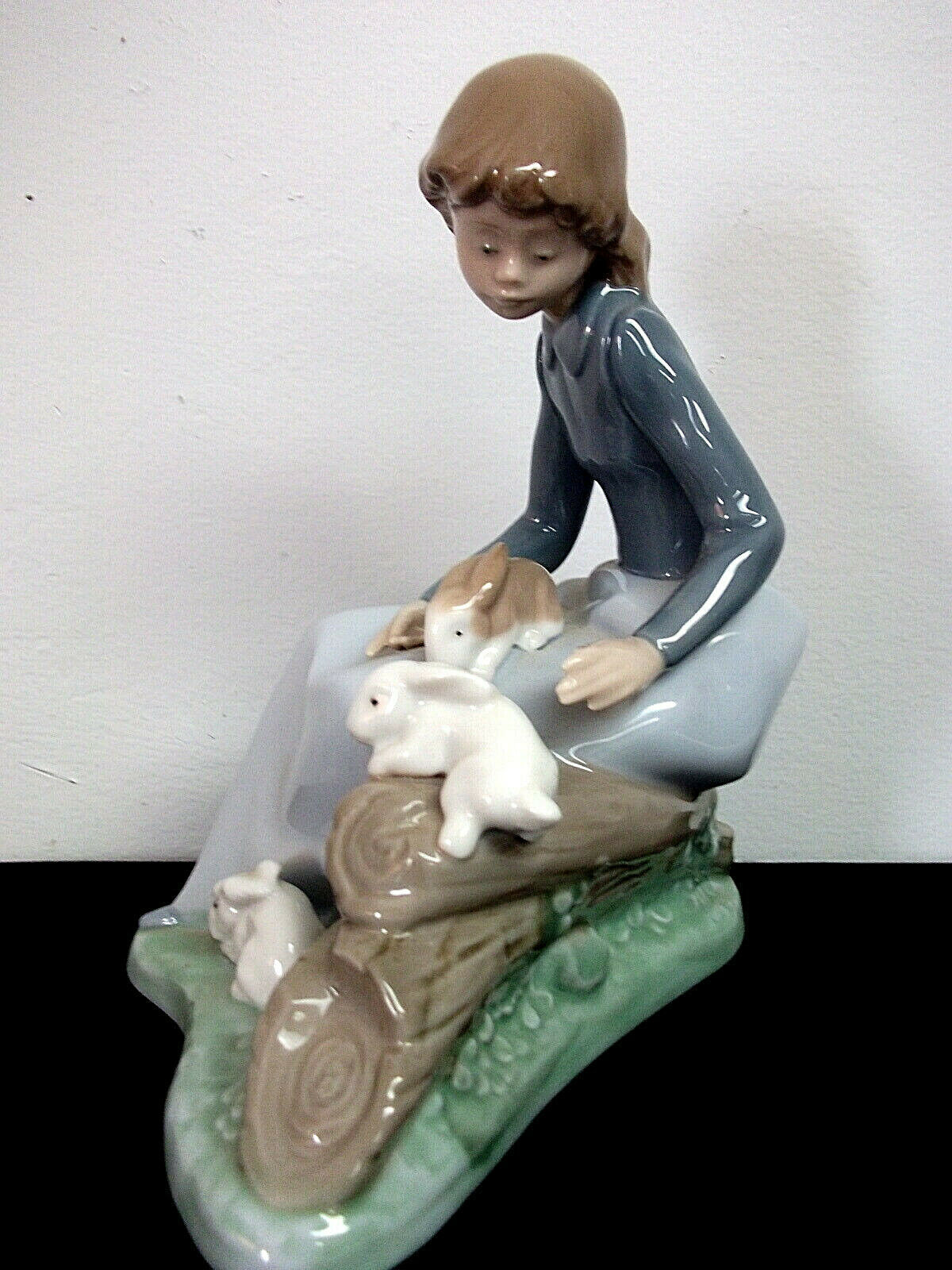 lladro woman with rabbit