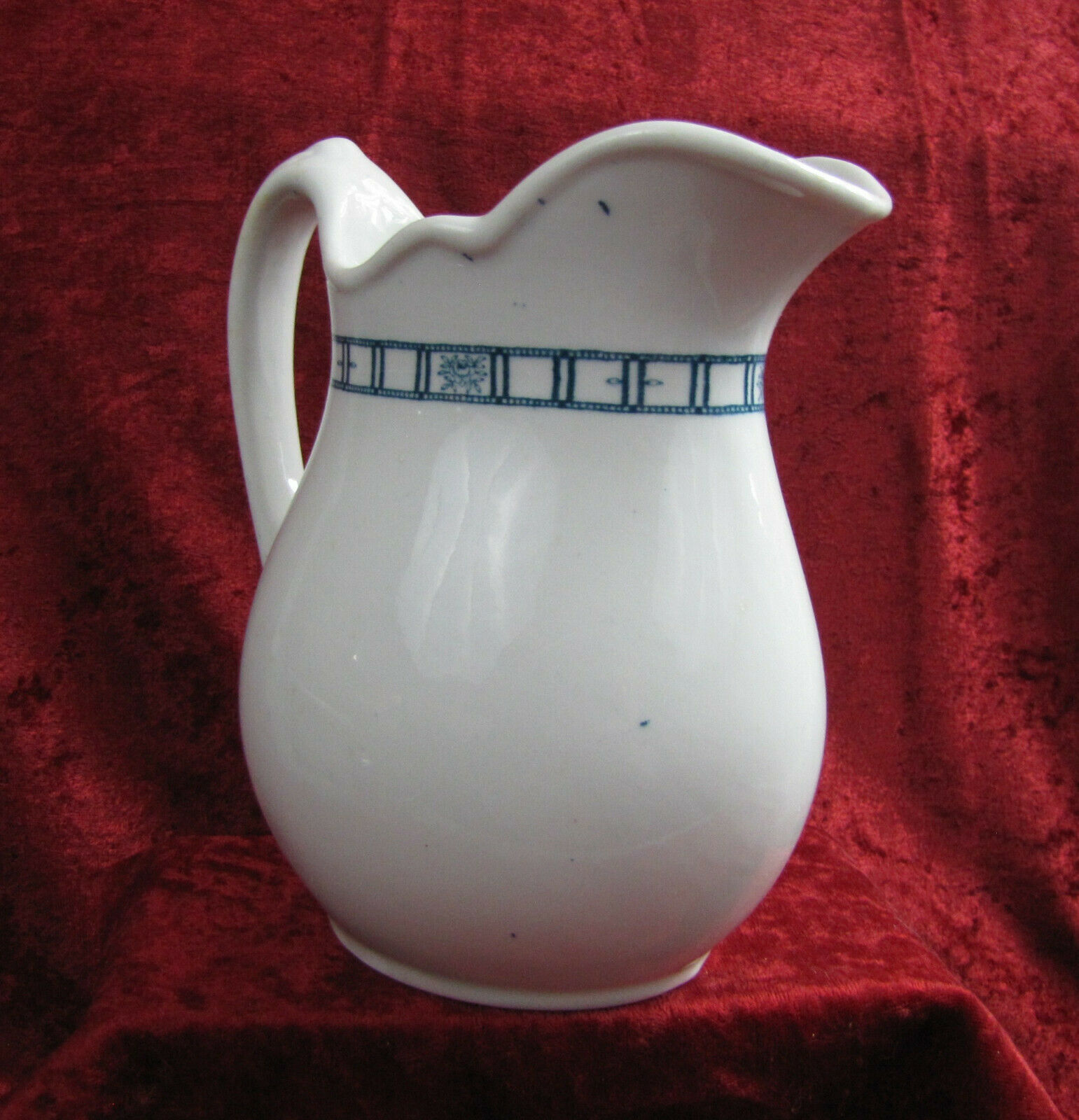 JACKSON CHINA, FALLS CREEK, PA WHITE CERAMIC PITCHER W/BLUE FLORAL