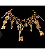 Vintage large skeleton Charm bracelet - turquoise rhinestones key charms... - $145.00