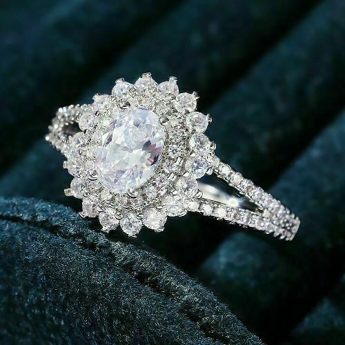 2.45Ct Oval Cut White Diamond 925 Sterling Silver Sunburst Halo Engagement Ring