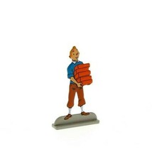 Tintin carrying bricks metal figurine