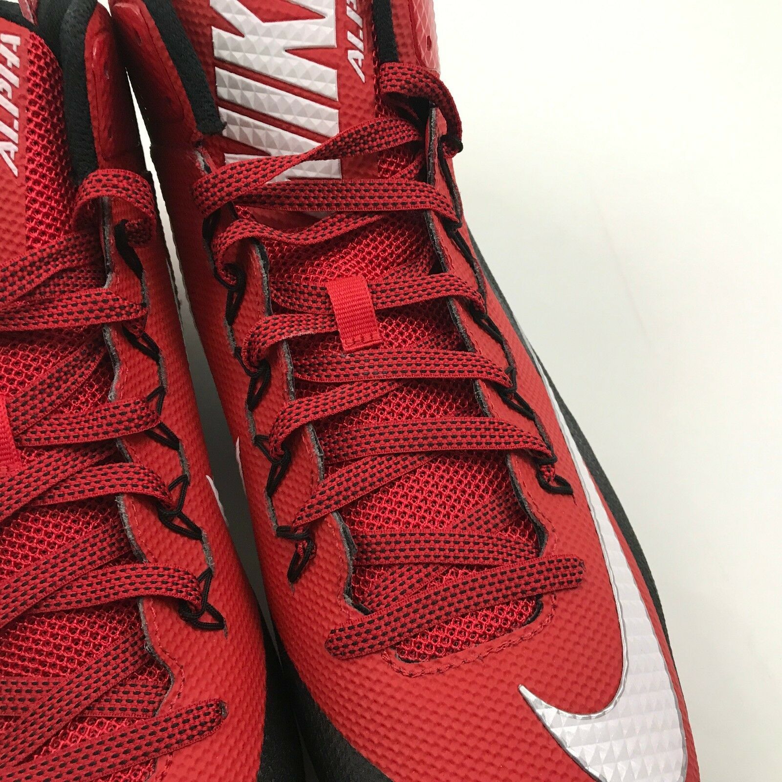 nike alpha cleats red