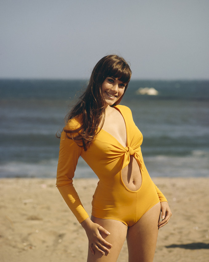 Barbi Benton yellow suit on beach tied above navel 16x20 Poster. 