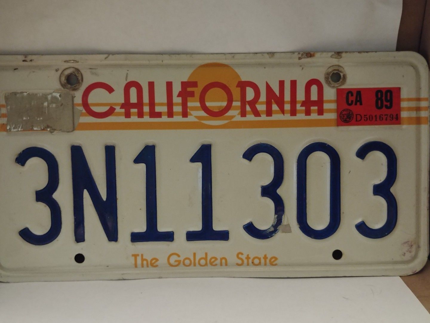 california-license-plate-white-metal-blue-letters-the-golden-state