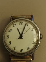 Timex Analog Winding Watch with Gold Tone Metal Band - $30.00