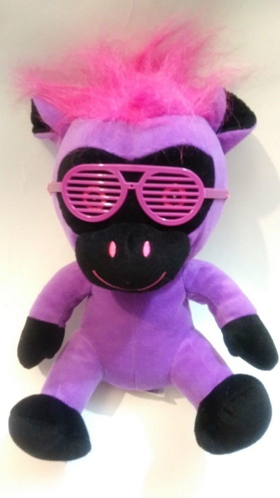 stuffed animal with glasses