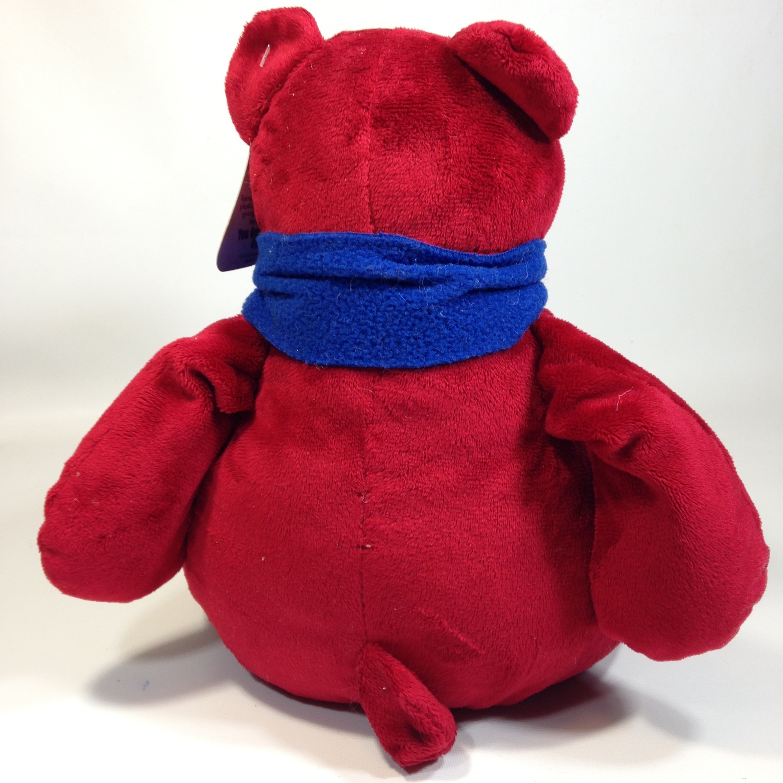 teddy bear with red scarf