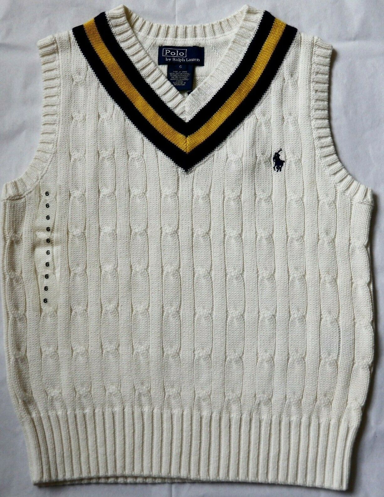 white polo sweater vest