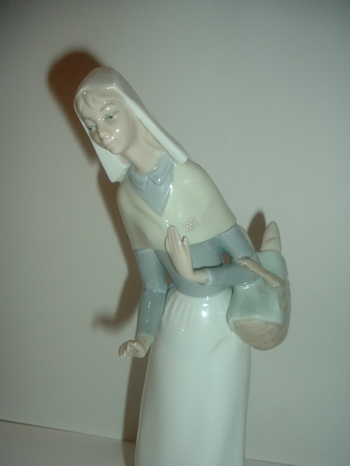 lladro figurine lady with dog