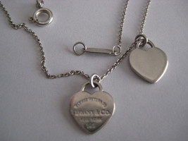 Tiffany & Co Mini Heart Necklace - $100.00