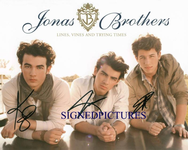 THE JONAS BROTHERS SIGNED AUTOGRAPH 8x10 RP PROMO PHOTO KEVIN NICK AND JOE