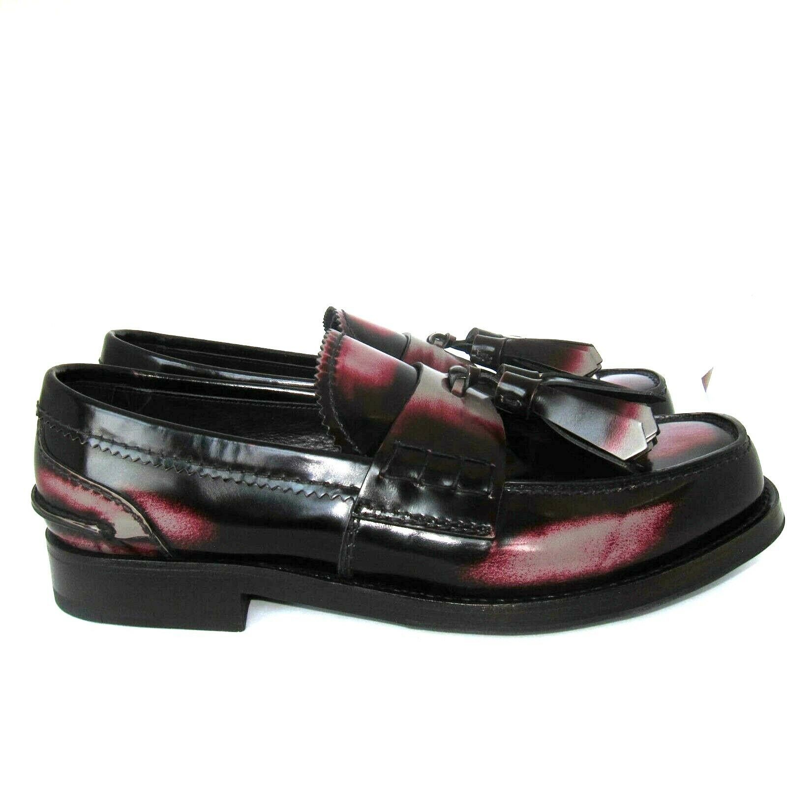 leather chain loafers by prada