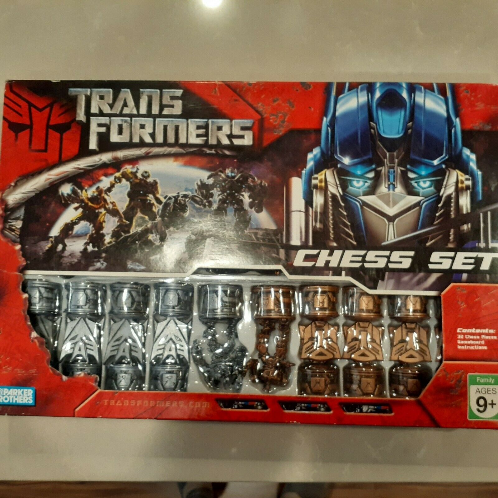 Hasbro Transformers Chess Set Never Used has plastic cover and