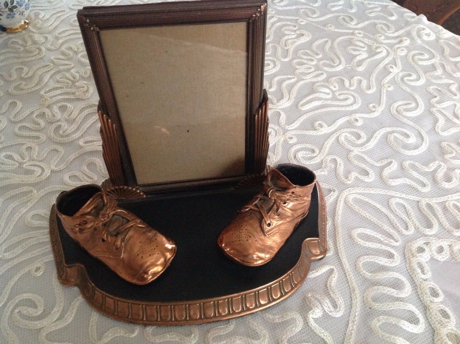 antique bronze baby shoes