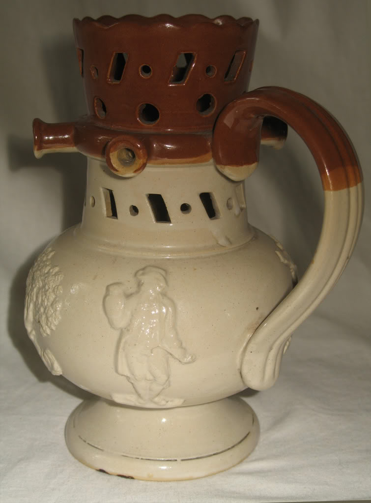 Antique An attractive 19th century Staffordshire / Denby Puzzle Jug