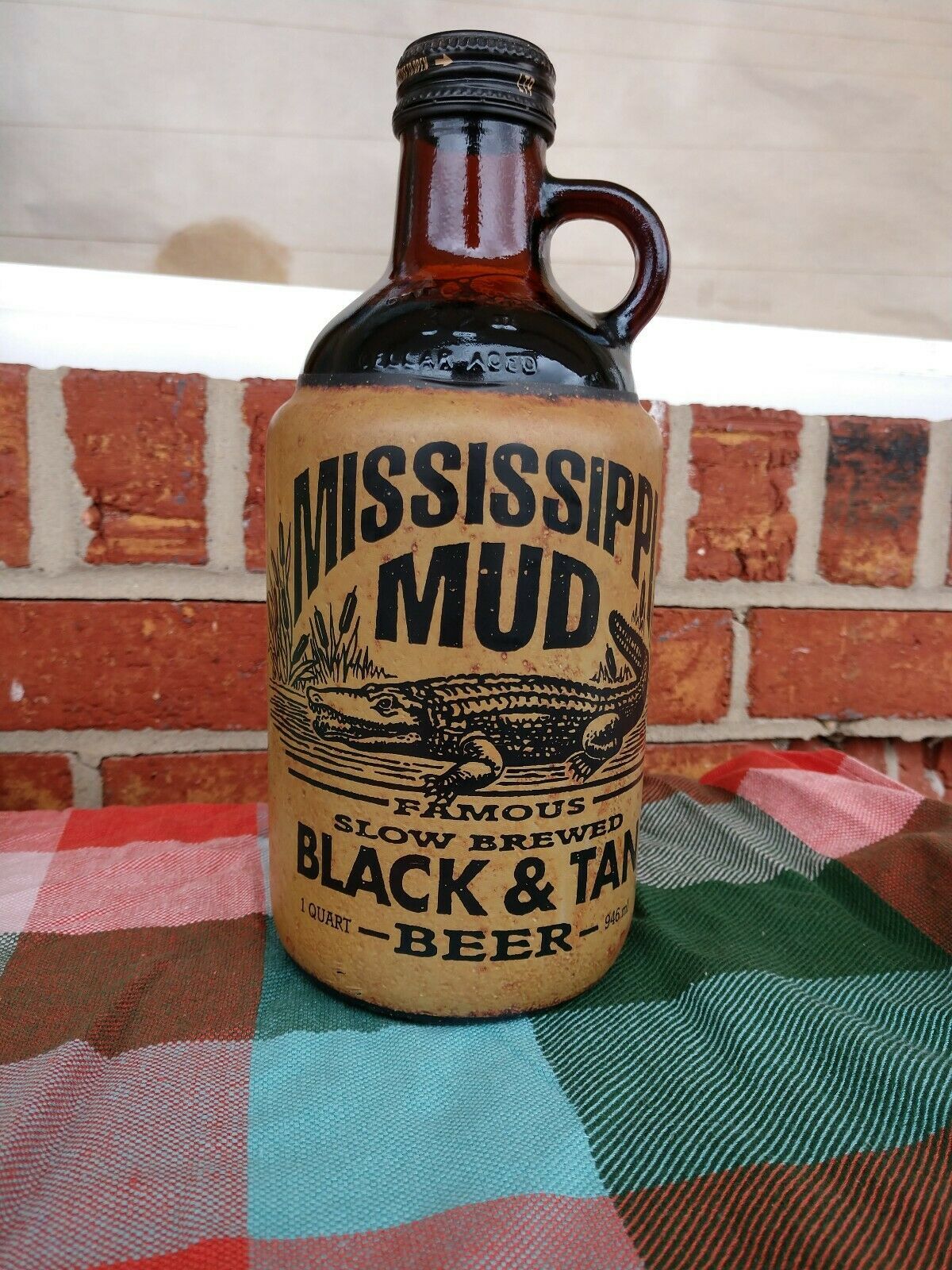 MISSISSIPPI MUD BLACK & TAN BEER BOTTLE 32 OZ. JUG WITH ORIGINAL CAP
