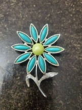 avon pins and brooches