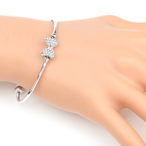 Silver Tone Bangle Bracelet With Swarovski Style Crystal Bow - $27.99