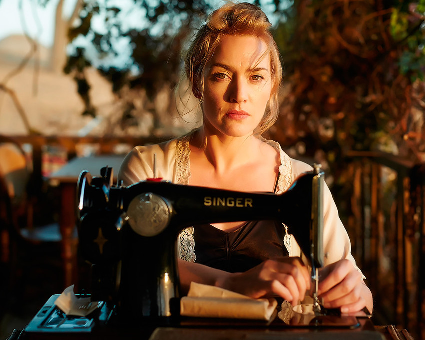 The Dressmaker Kate Winslet with vintage singer sewing machine 16x20 Canvas Gicl - $69.99