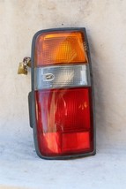93-97 Toyota Land Cruiser Tail Light Lamp & Housing Driver Left LH