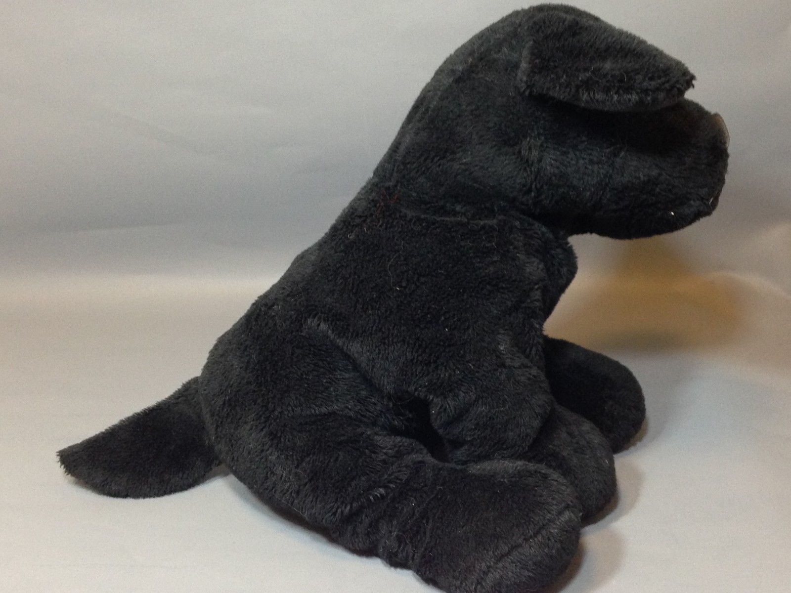 stuffed black lab toy