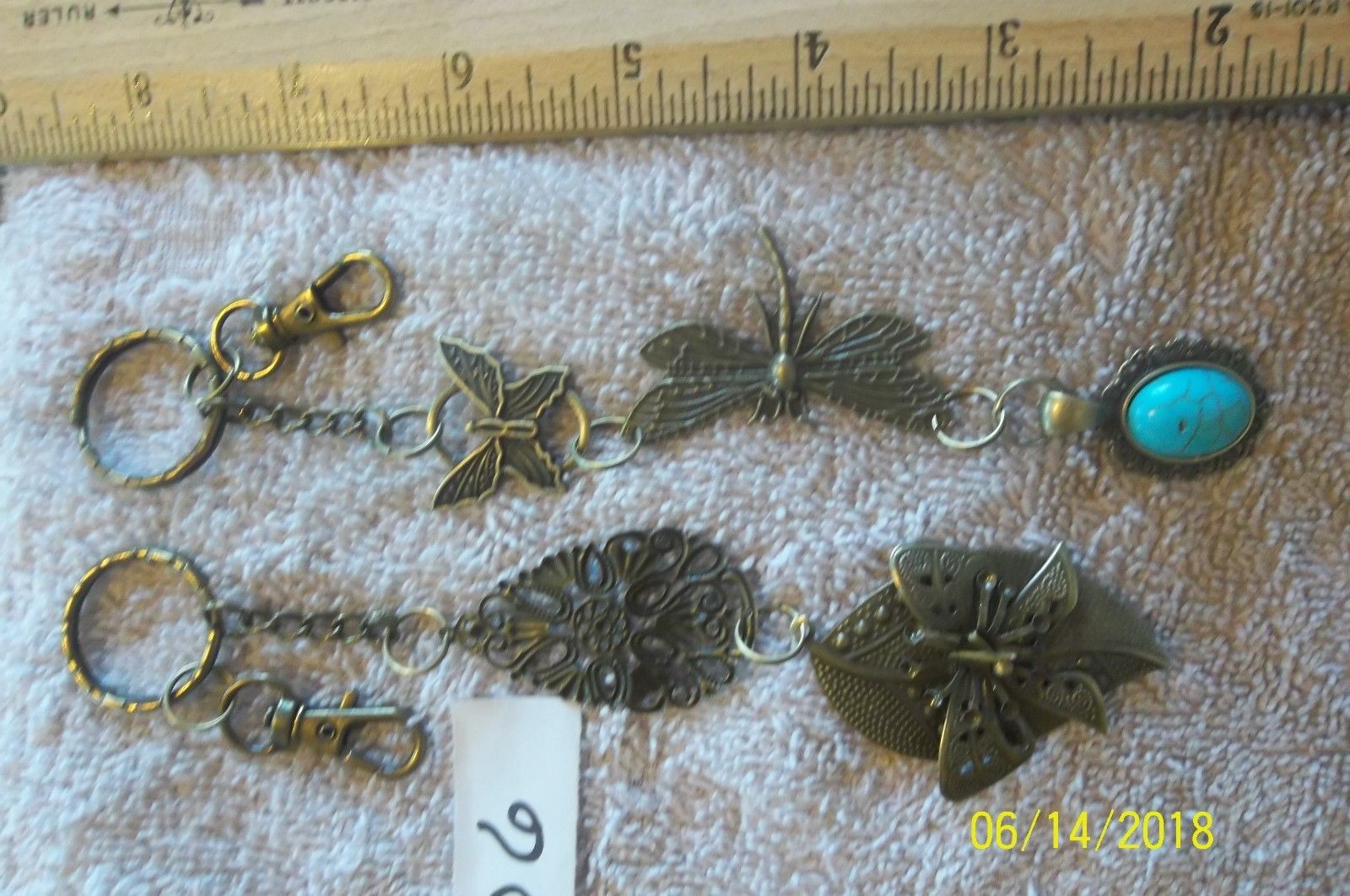 Primary image for <>< purse jewlrey bronze color keychain backpack filigree charms lot 06 lot of 2
