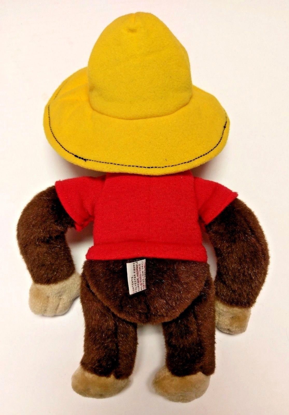 man with the yellow hat stuffed animal