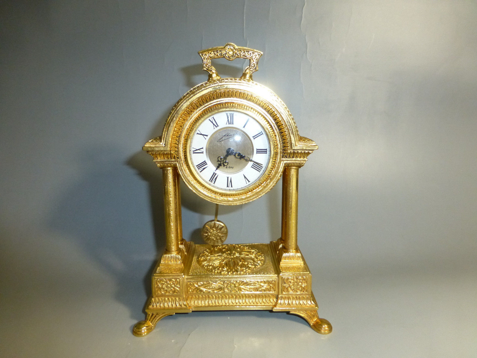 Antique clock swinger