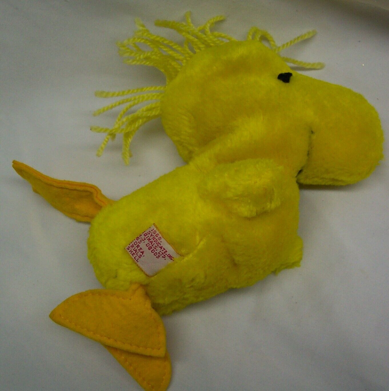 small woodstock stuffed animal