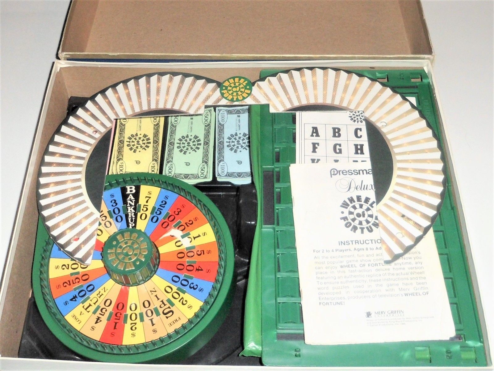 wheel of fortune deluxe edition board game