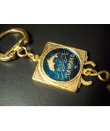 Sea World Key Chain Valet Style Gold Colored Metal with Blue and Gold Fe... - $7.99
