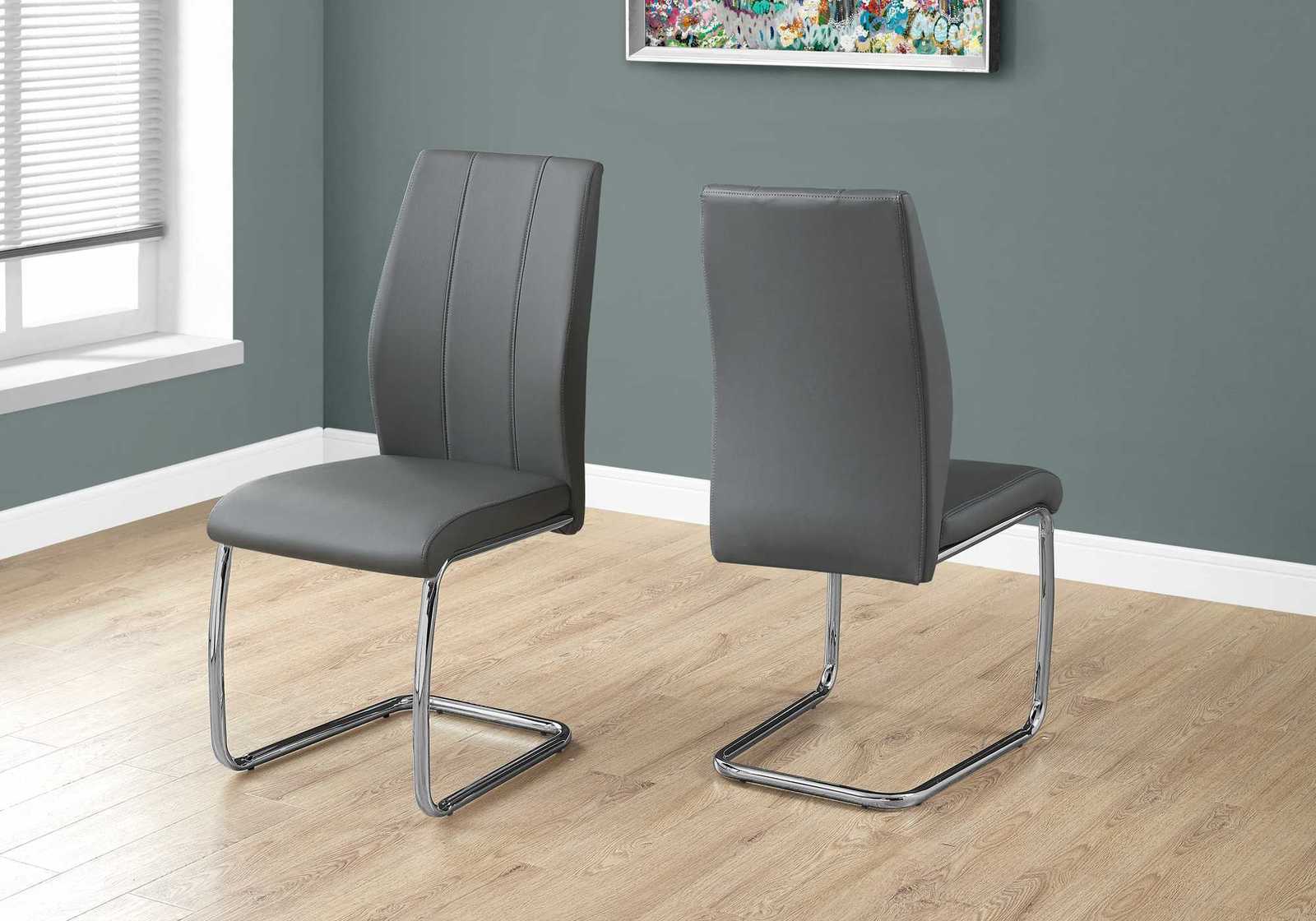 Two 77.5 Grey Leather Look Chrome Metal and Foam Dining Chairs
