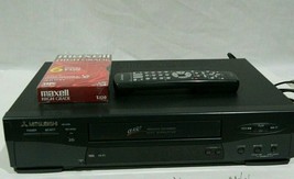 Mitsubishi HS-U466 4-Head Hi Fi VHS VCR remote and VHS tape - $49.49