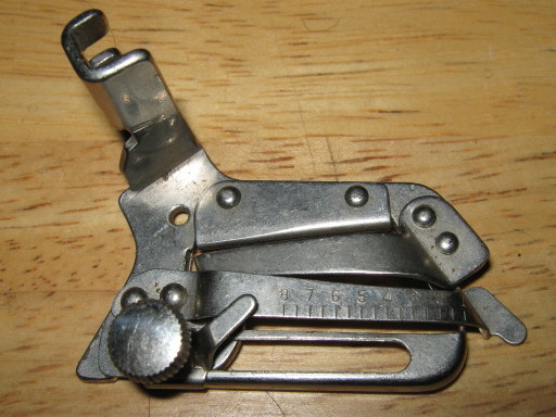 Singer Featherweight 221 sewing accessories adjustable hemmer 35931