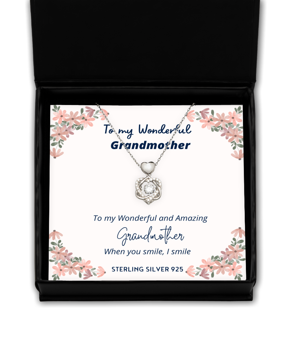 To my Grandmother, when you smile, I smile - Heart Knot Silver Necklace. Model