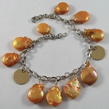 .925 RHODIUM SILVER BRACELET WITH ORANGE MOTHER OF PEARL AND GOLDEN DISC image 1