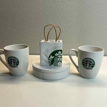 Starbucks set 2 coffee mugs 10.2 fl oz and Starbucks Ceramic White Shopping Bag - $59.40